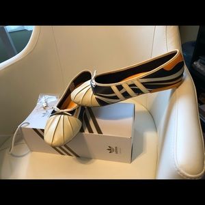 Women’s adidas ballerina flats.